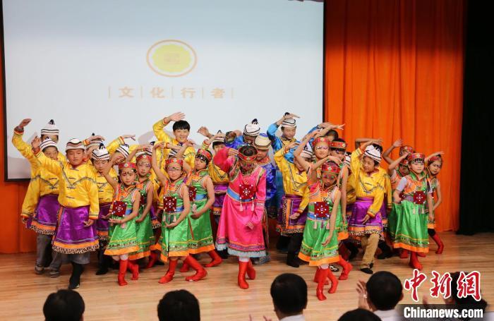 圖為蘭州大學(xué)文化行者團(tuán)隊(duì)走進(jìn)民族社區(qū)，開展系列活動(dòng)。(資料圖)蘭州大學(xué)供圖